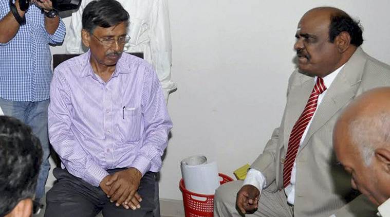 Kolkata: Justice C S Karnan of Calcutta High Court interacts with a team of doctors from a State-run mental hospital at his residence in Kolkata on Thursday. Justice Karnan as he refused to undergo any mediacal test despite Supreme Court's order for the same. PTI Photo   (PTI5_4_2017_000167B)